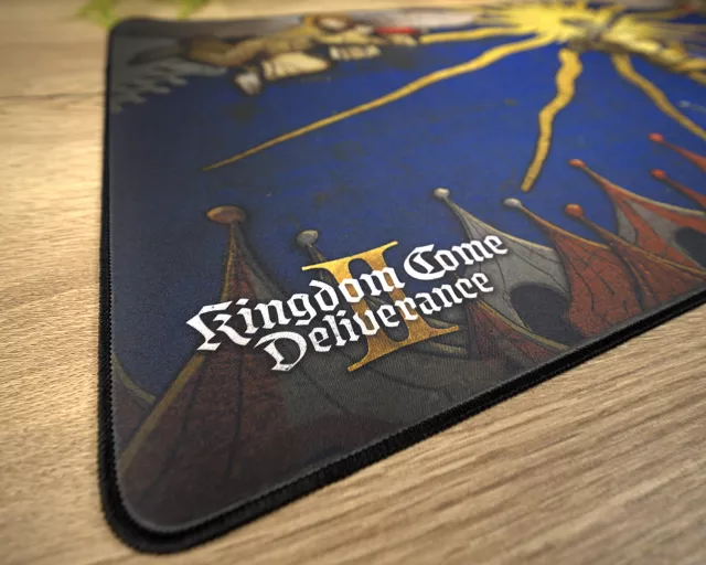 Podložka pod myš Kingdom Come: Deliverance II - Zázrak v táboře (89 × 40 cm) - Xzone Originals